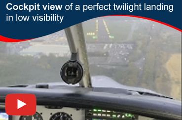 Cockpit view of a perfect twilight landing in low visibility